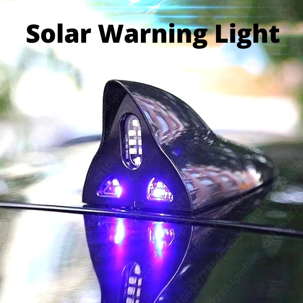 LED shark fin antenna mounted on black car